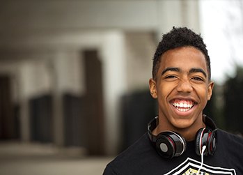 Teenager smiling at school after receiving nitrous oxide