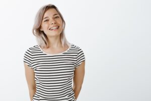 Young girl smiling with braces.